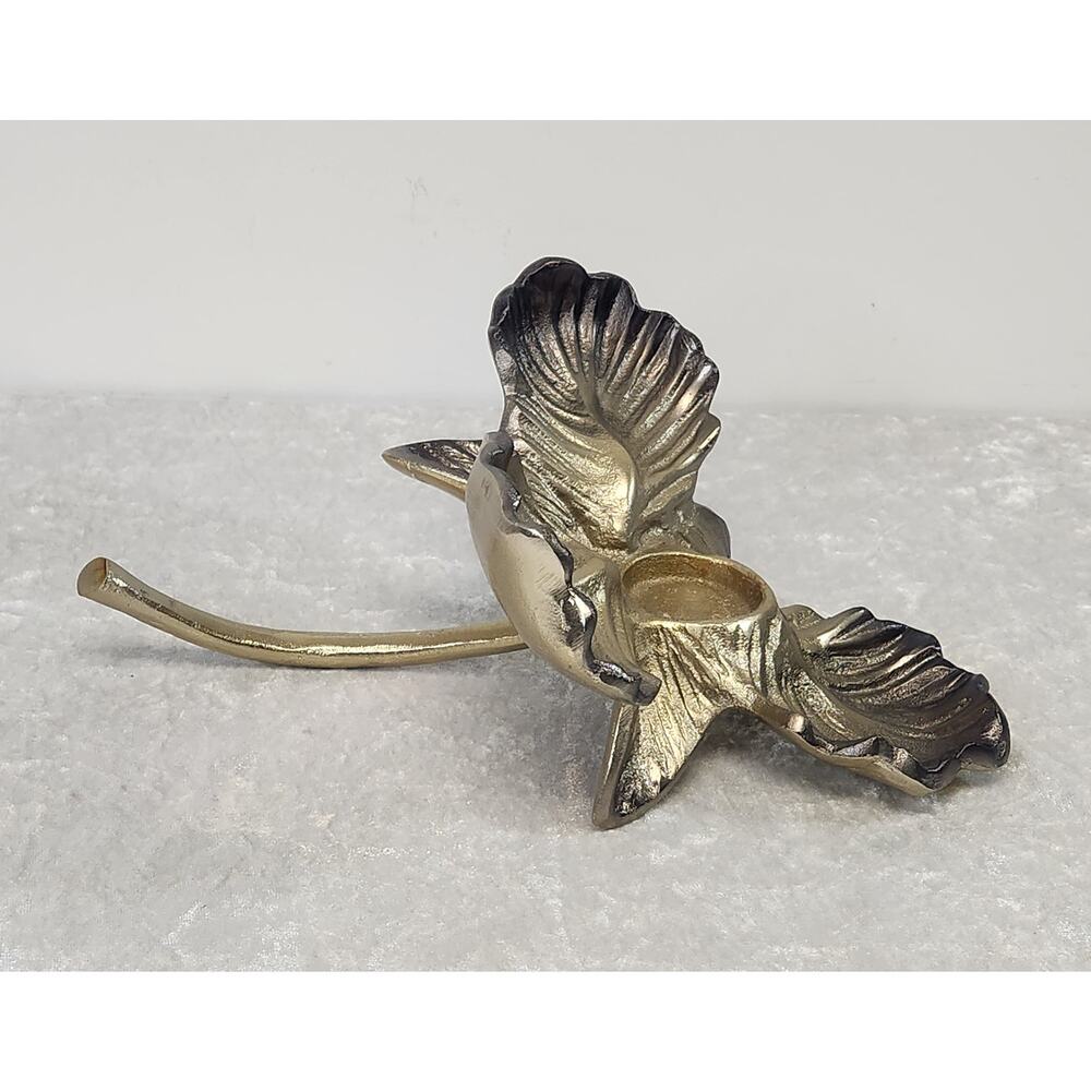 Decorative gold-toned orchid-shaped tealight candleholder